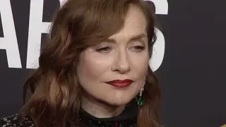 Isabelle Huppert and Zoe Kravitz at The 75th Annual Golden Globe Awards