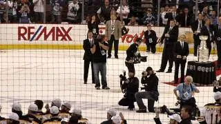 Fans boo Gary Bettman as he presents the 2011 Stanley Cup to the Boston Bruins