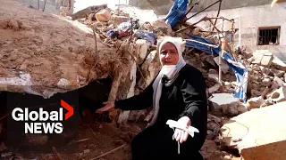 "Just let me find one:" Libya flood survivor begs as she digs for 7 missing loved ones under rubble