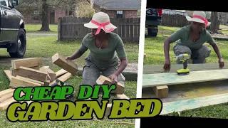 Building raised garden bed using fencing boards.