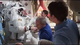 The crew prepares for a spacewalk