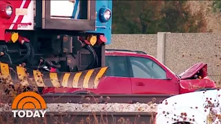 Cop Saves Driver Stuck On Train Tracks With Seconds To Spare | TODAY