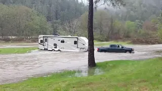 Trailer Pulled From Flooded Camp Grounds After Owner Woke Up With 'River on Both Sides'
