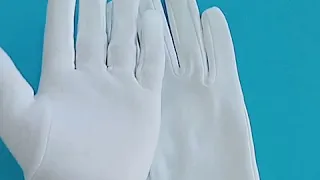 white cotton gloves