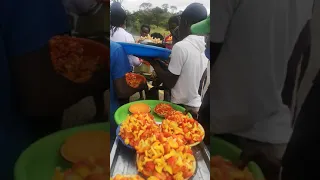 BUYING WILD MUSHROOMS ON THE BULAWAYO ROAD. YUMMY. ZIMBABWE