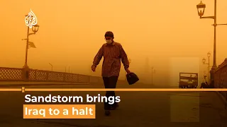 Skies turn orange in Iraq as sandstorm causes illness