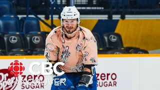 Goalie's pink paisley T-shirt becomes unlikely addition to Canucks' fashion lineup