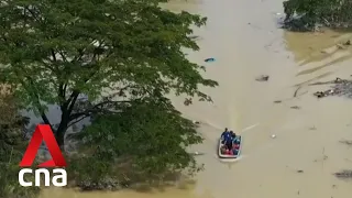 Malaysia braces for more bad weather as authorities race to rescue flood victims
