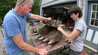 Repairing a cracked backhoe bucket