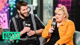 "Isn't It Romantic" Co-Stars Rebel Wilson & Liam Hemsworth Joke About Love Scene Awkwardness