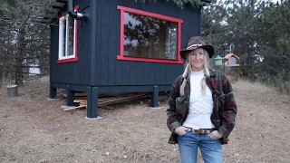 I painted our cabin black- PLUS my unusual door. DAY 5-6 Tiny Cabin Build