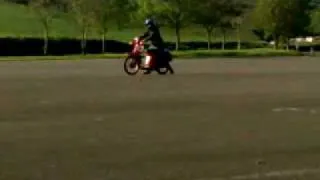 Honda SH50 wheelies.