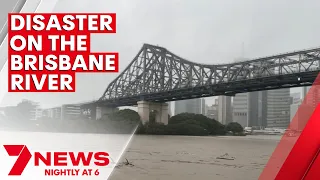 Brisbane River leaves fierce path of destruction as floods hit South East Queensland | 7NEWS