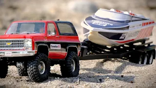 Traxxas Chevy Blazer tows Thrasher Jet Boat to the river!