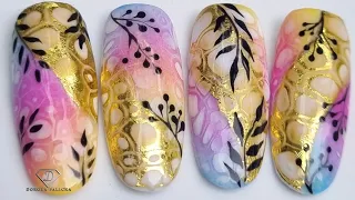 Blooming gel with transfer foil nail art. Summer nail design.