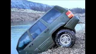 Offroad 4x4 Nissan patrol Land rover defender Mitsubishi pajero and Jeep in water 4K