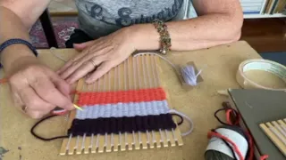 Weaving on a Wooden Loom
