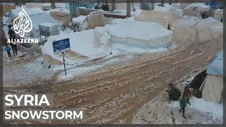 Severe snowstorm hits displaced Syrians in tent camps