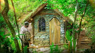 Alone construction of a Stone House. Bushcraft in the forest