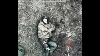 GRAPHIC Russian soldier blown in half from (4)VOG grenades dropped from Ukraine Arm forces by drone.