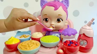 Comida interactiva para muñecas 🧁 My Garden Baby y la trona de Baby Annabell