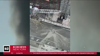 Construction workers raced to clear street before crane's boom came down