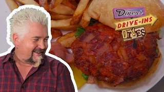 Guy Fieri Tries a Bacon and Blue Cheese Stuffed Burger | Diners, Drive-ins and Dives | Food Network