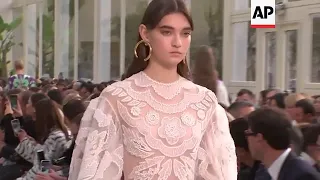 Kaia Gerber walks the runway at Valentino's  spring-summer 2019 show with big hats, feathered flats,