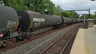 CSX M404 with ex Chessie System box cars and autoracks at Olney Pa.