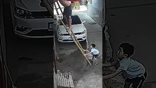 Chinese boy saves father from bad fall by holding broken ladder steady #shorts #trends #crazy