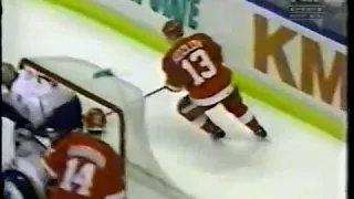 Slava Kozlov got hit by Craig Conroy from Blues (1997)