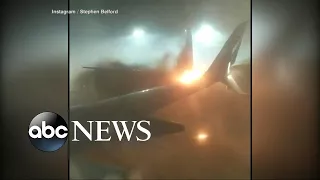 2 planes collide at Toronto airport causing the tail of one plane to catch fire