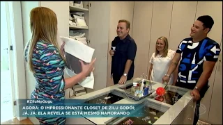 Durante visita de Gugu, Zilu mostra a sua coleção de óculos e bolsas de luxo