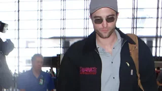 Robert Pattinson Wastes No Time At LAX