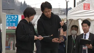 Japan to scale down Olympic torch relay to lantern tour