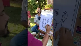 Caricature Artists Draws Live Sketch of a Guy - 1276846-2