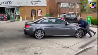 Alleged thieves were filmed driving off with a BMW from the forecourt of a petrol station in London