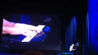 Chris Martin of Coldplay sings a new song at Apple's event