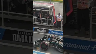 Daniel Ricciardo giving the finger to George Russell