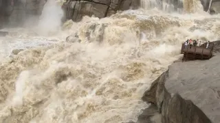 Orange river flood at Augrabies 13 February 2021,main falls from the 3rd observation platform.