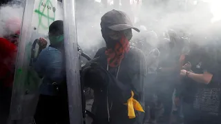 Feminist protesters battle with police in Mexico City