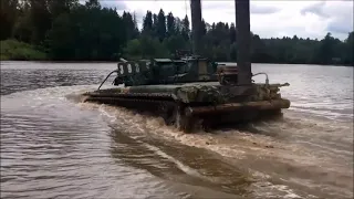 Russian gas turbine main battle tank T - 80 U forcing the rive