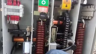 Manual spring charging close and triping.