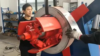 How is the decoiler loading the coil material