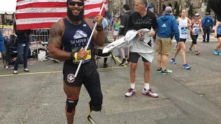 Marine who lost a leg in Afghanistan carries American flag while running Boston Marathon