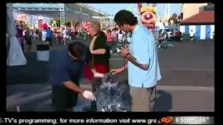 TV reporter knocks over  ice sculpture