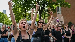 Protesters welcome Rammstein to Bern with middle fingers in the air