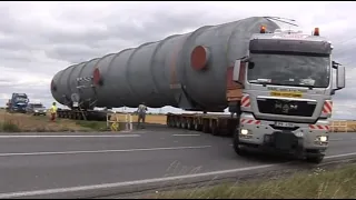 Extreme Dangerous Transport Skill Operations Oversize Truck. Heavy Equipment Crane In Working