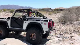 Axial scx10.3 early bronco and driver desert wheelin with a passenger.#rccrawler #axial