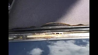 How to fix your sunshade when it detaches from the track for a 2009 Mini Cooper